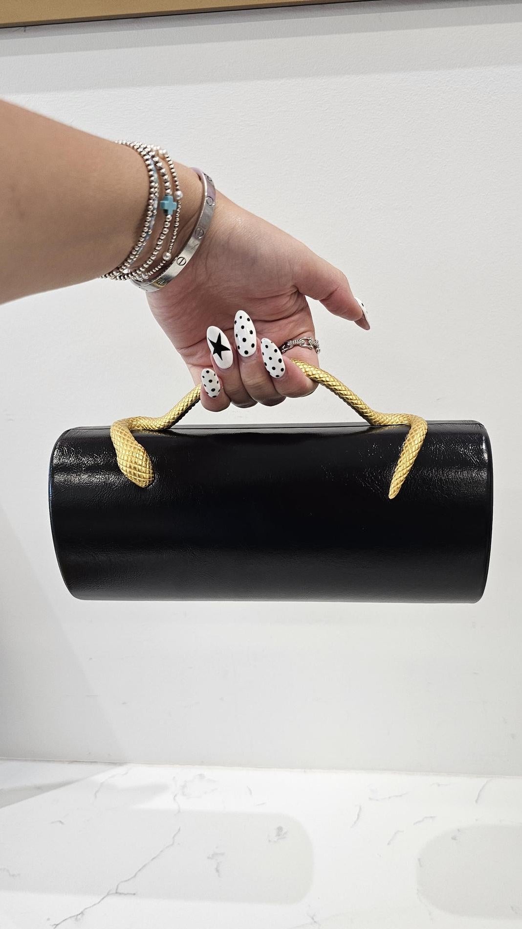 Snake Handle Cleo Clutch